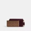 Mila-crossbody-veske med Signature Canvas