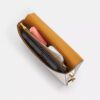Mila-crossbody-veske med Signature Canvas