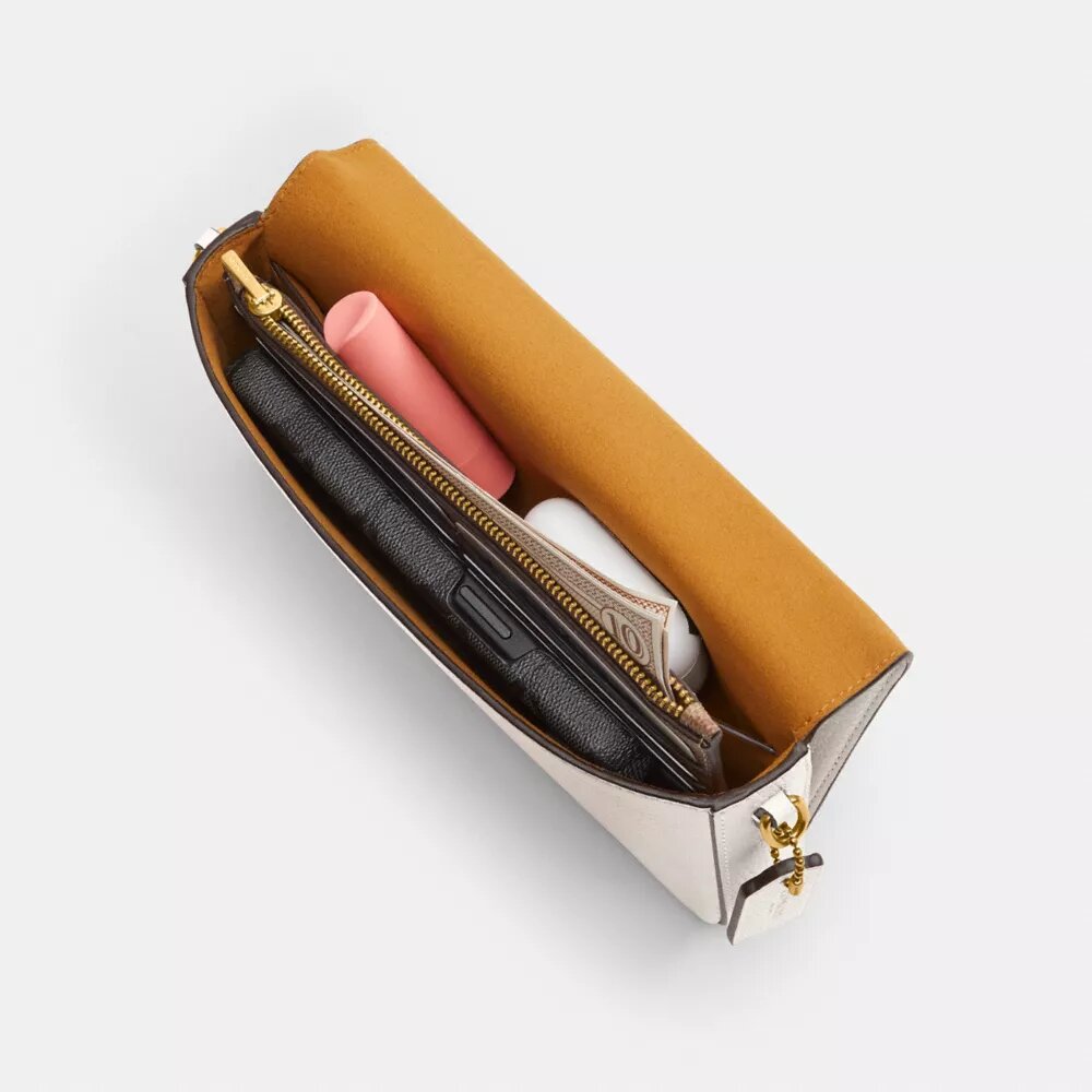 Mila-crossbody-veske med Signature Canvas