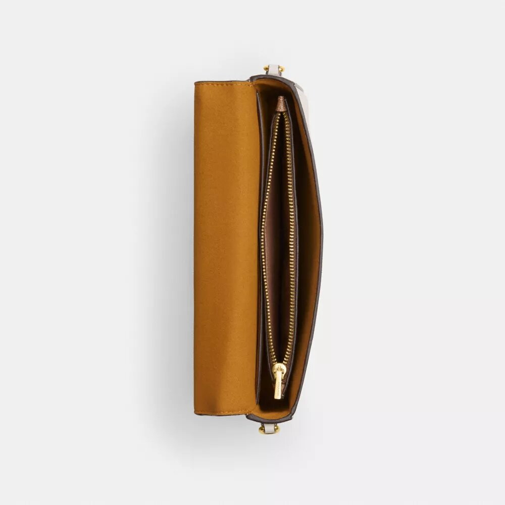 Mila-crossbody-veske med Signature Canvas