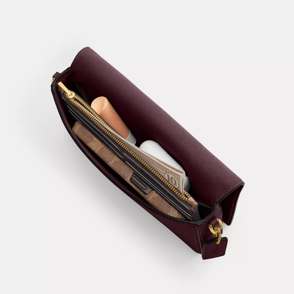 Mila-crossbody-veske med Signature Canvas