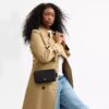 Mila-crossbody-veske med Signature Canvas