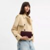 Mila-crossbody-veske med Signature Canvas