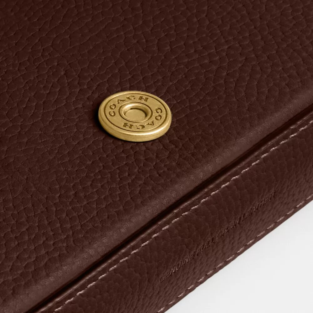Mila-crossbody-veske med Signature Canvas