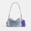 Mini Carey-crossbody-veske i «Loved Denim» med anheng