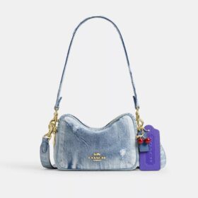 Mini Carey-crossbody-veske i «Loved Denim» med anheng
