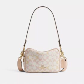 Mini Carey-crossbody-veske i Signature Canvas