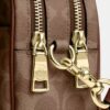 Mini Carey-crossbody-veske i Signature Canvas