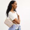 Mini Carey-crossbody-veske i Signature Canvas