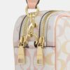Mini Carey-crossbody-veske i Signature Canvas