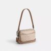 Mini Carey-crossbody-veske i Signature Canvas
