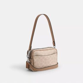 Mini Carey-crossbody-veske i Signature Canvas