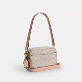 Mini Carey-crossbody-veske i Signature Canvas