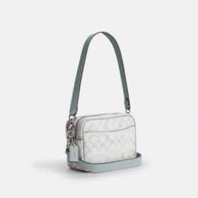 Mini Carey-crossbody-veske i Signature Canvas