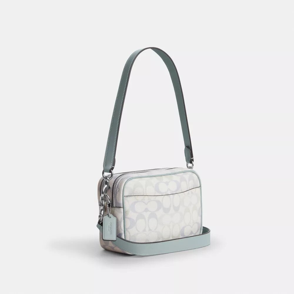 Mini Carey-crossbody-veske i Signature Canvas