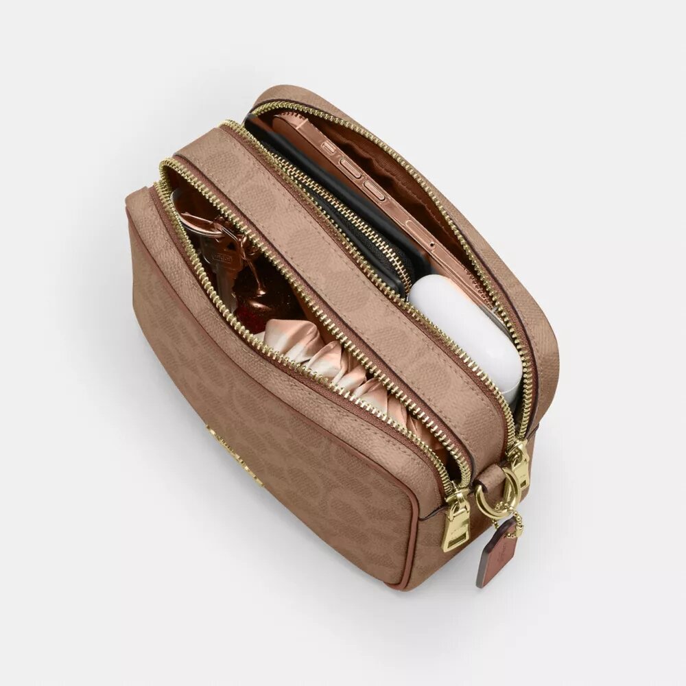 Mini Carey-crossbody-veske i Signature Canvas