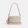 Mini Carey-crossbody-veske i Signature Canvas