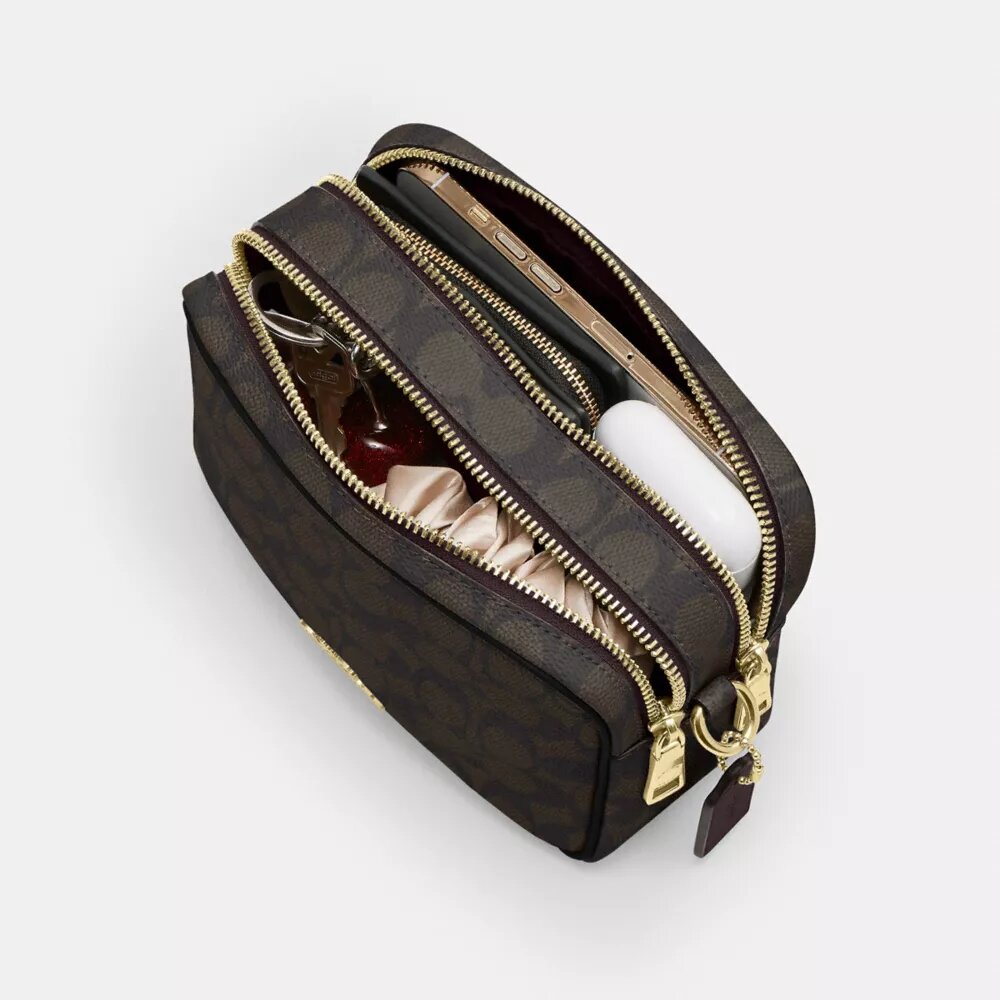 Mini Carey-crossbody-veske i Signature Canvas