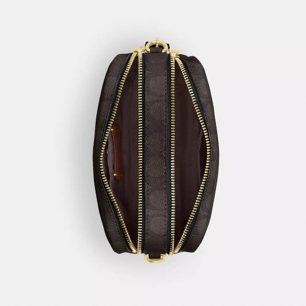 Mini Carey-crossbody-veske i Signature Canvas