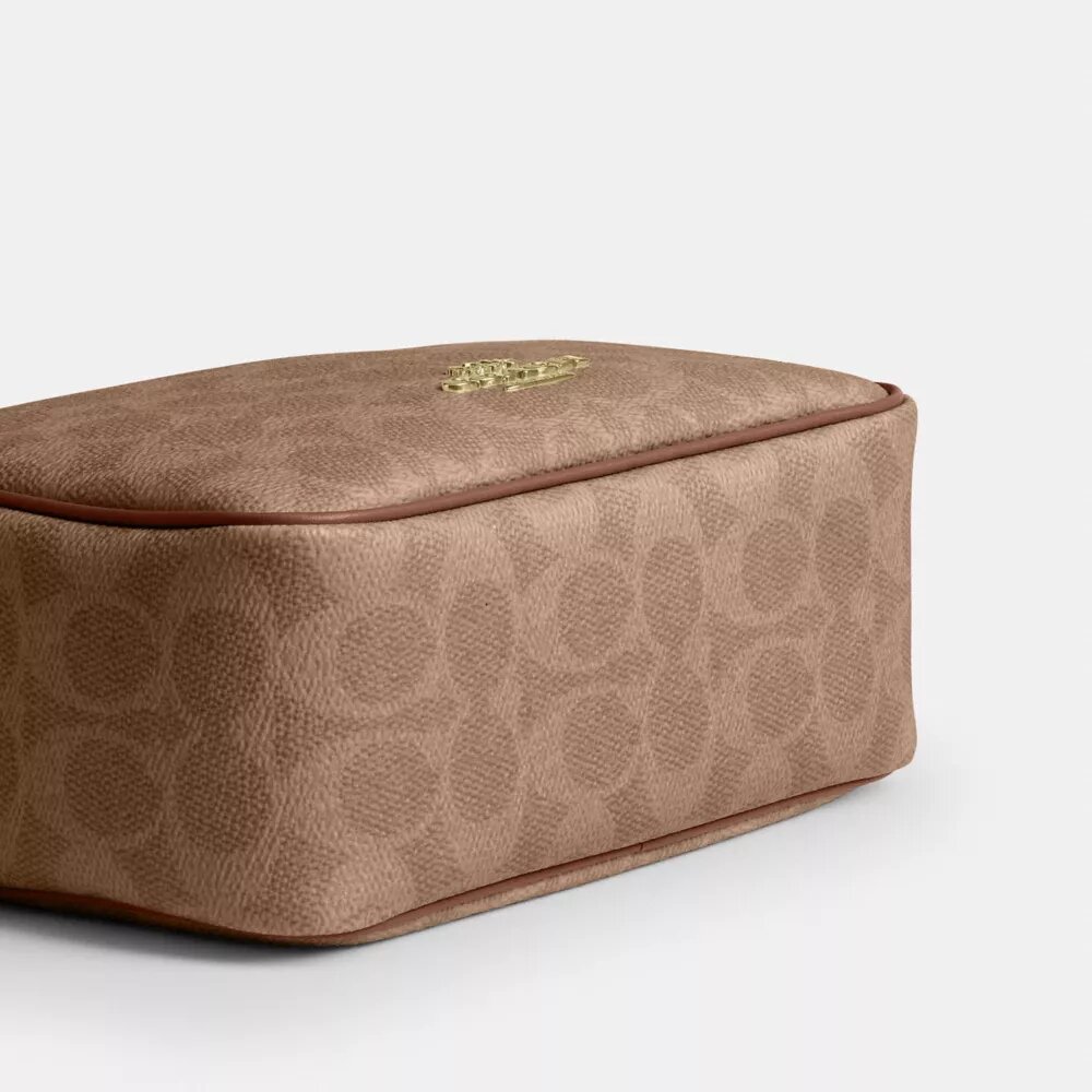 Mini Carey-crossbody-veske i Signature Canvas