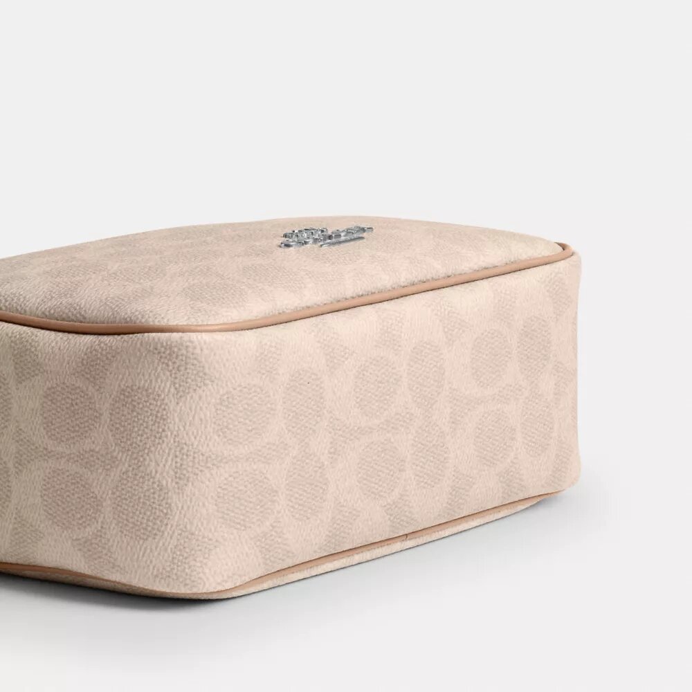 Mini Carey-crossbody-veske i Signature Canvas