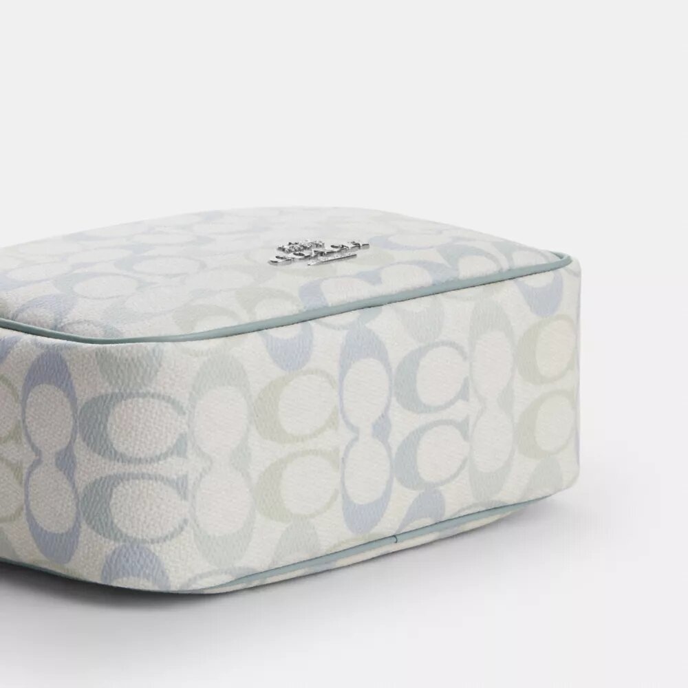 Mini Carey-crossbody-veske i Signature Canvas