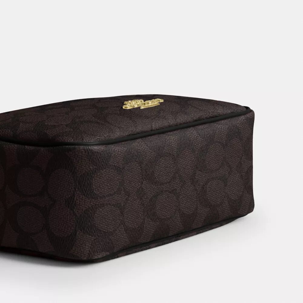 Mini Carey-crossbody-veske i Signature Canvas
