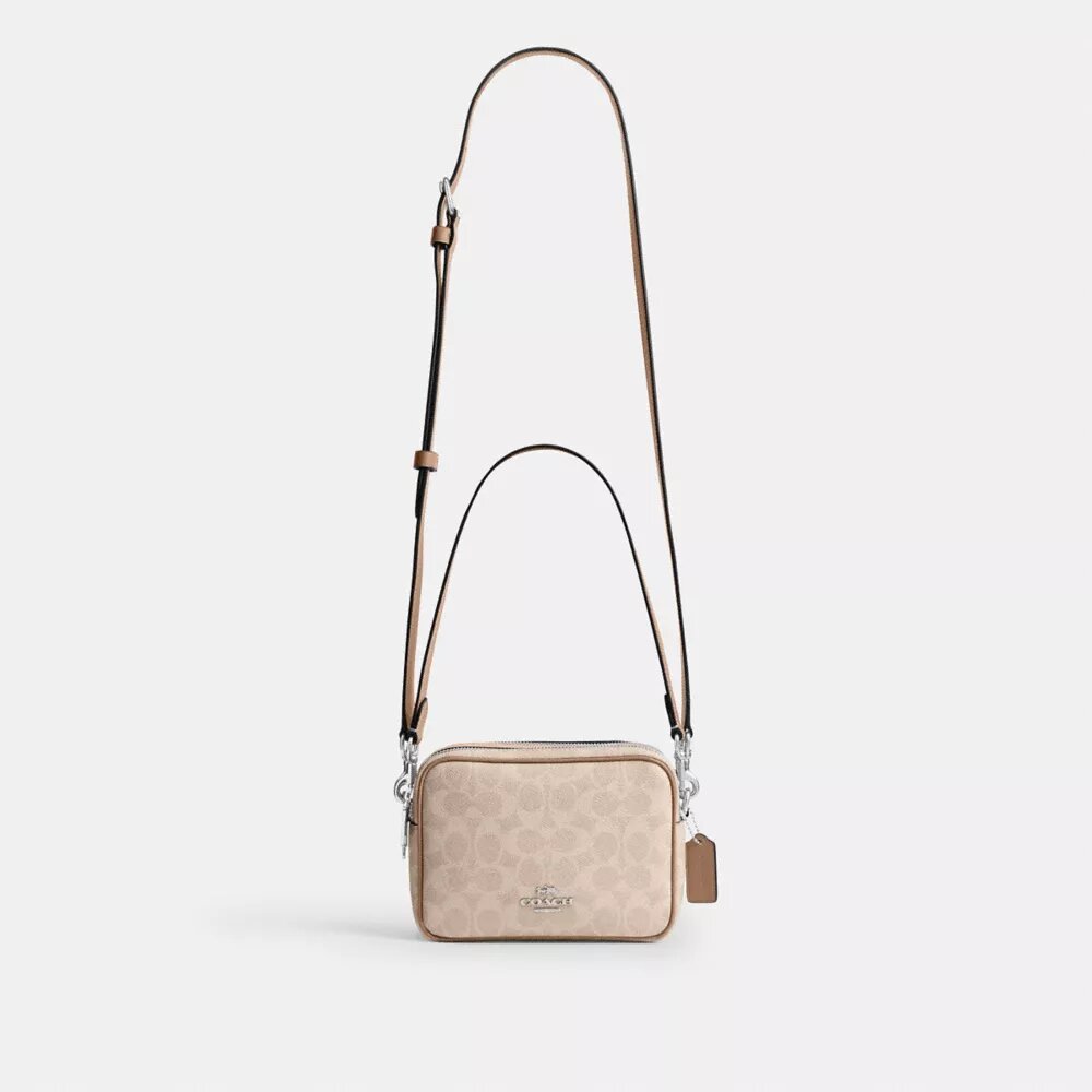 Mini Carey-crossbody-veske i Signature Canvas