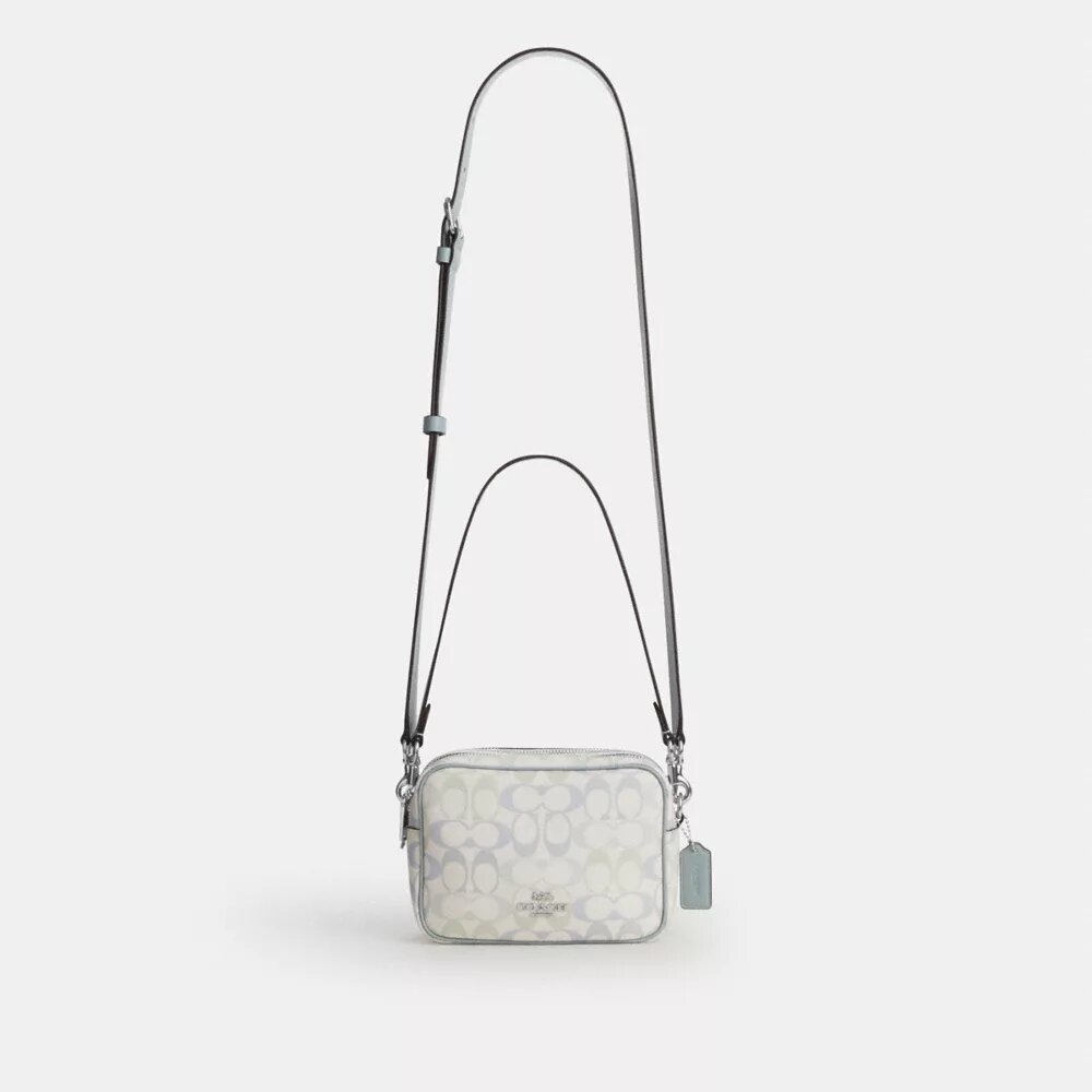 Mini Carey-crossbody-veske i Signature Canvas