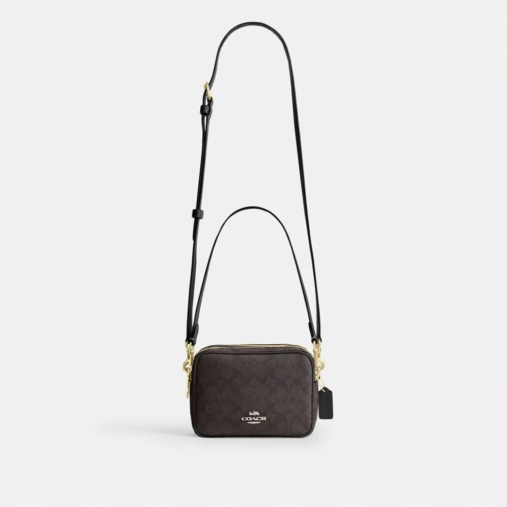 Mini Carey-crossbody-veske i Signature Canvas