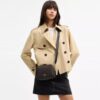 Mini Carey-crossbody-veske i Signature Canvas