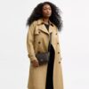 Mini Carey-crossbody-veske i Signature Canvas