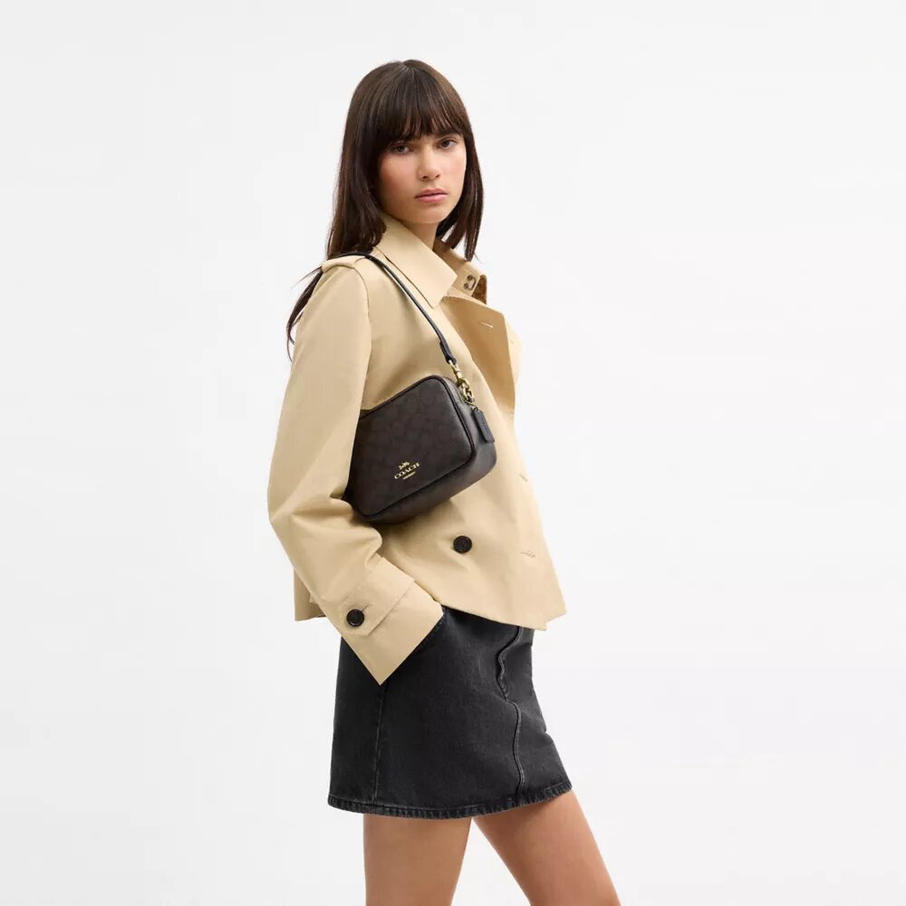 Mini Carey-crossbody-veske i Signature Canvas