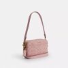 Mini Carey-crossbody-veske i Signature Denim