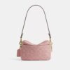 Mini Carey-crossbody-veske i Signature Denim