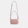 Mini Carey-crossbody-veske i Signature Denim