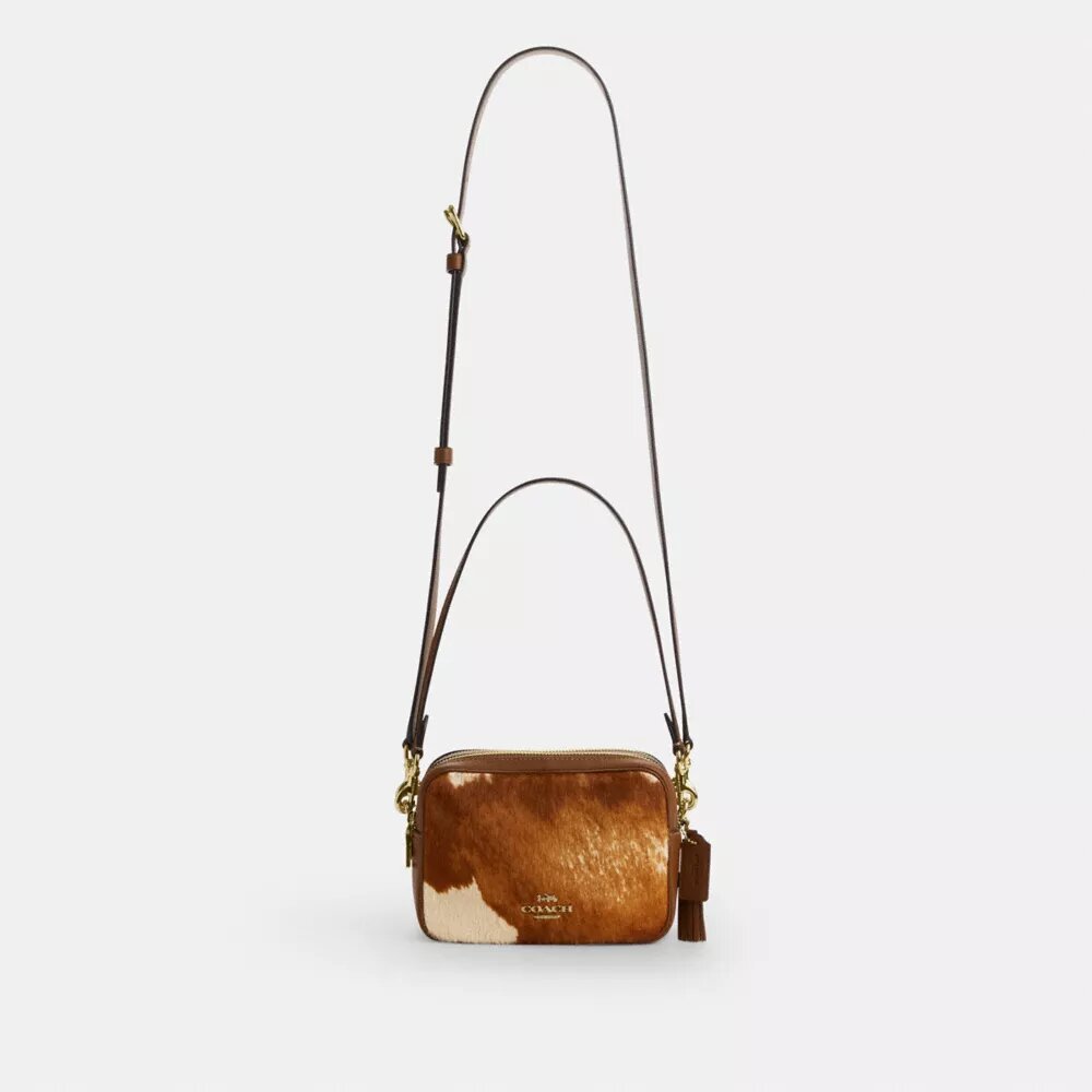 Mini Carey-crossbody-veske med kryssrem i hårkalv med ku-mønster