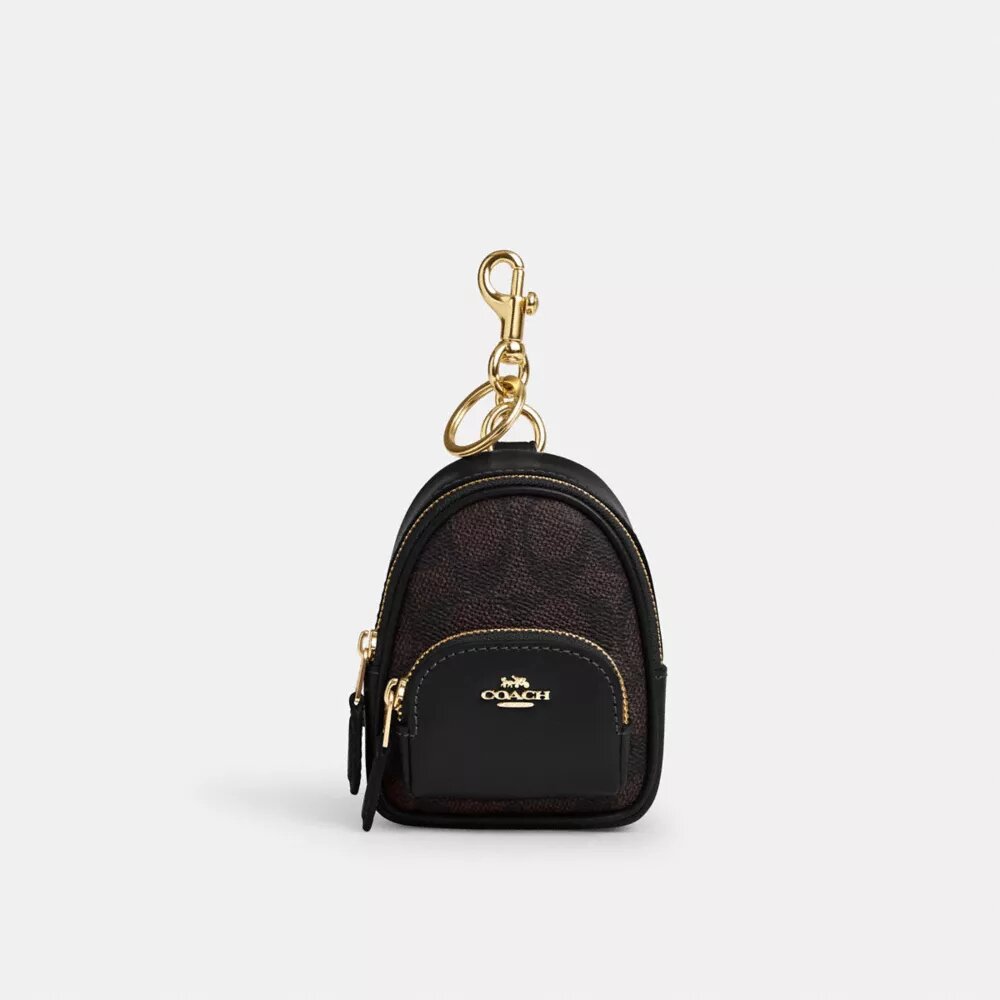 Mini Court Backpack-veskeanheng i Signature Canvas