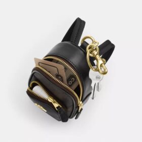 Mini Court Backpack-veskeanheng i Signature Canvas