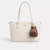 Mini Court Backpack-veskeanheng i Signature Canvas