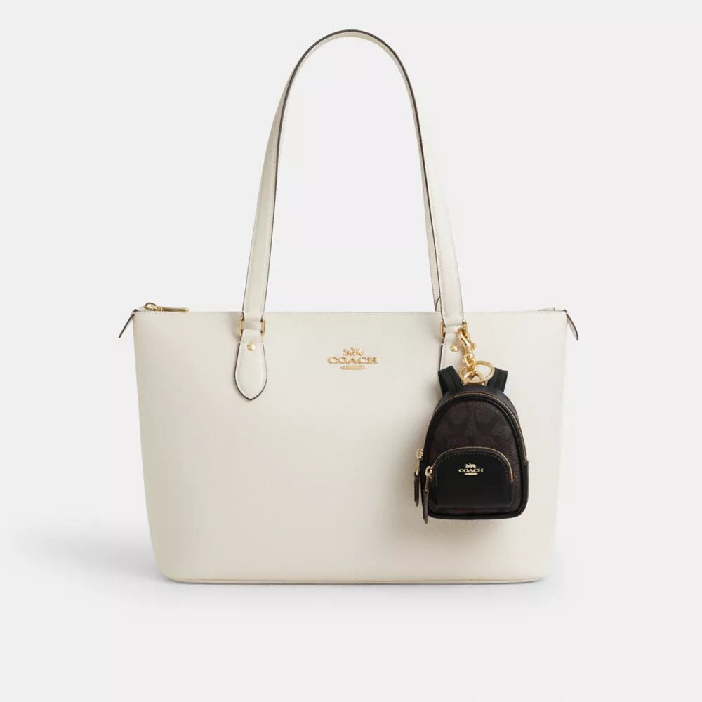 Mini Court Backpack-veskeanheng i Signature Canvas