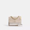 Mini Klare-crossbody-veske i Signature Canvas