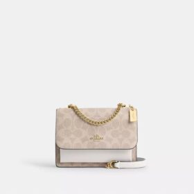 Mini Klare-crossbody-veske i Signature Canvas