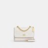Mini Klare-crossbody-veske i Signature Canvas