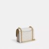 Mini Klare-crossbody-veske i Signature Canvas