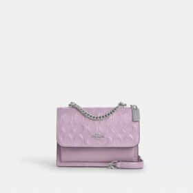 Mini Klare-crossbody-veske i signaturlær