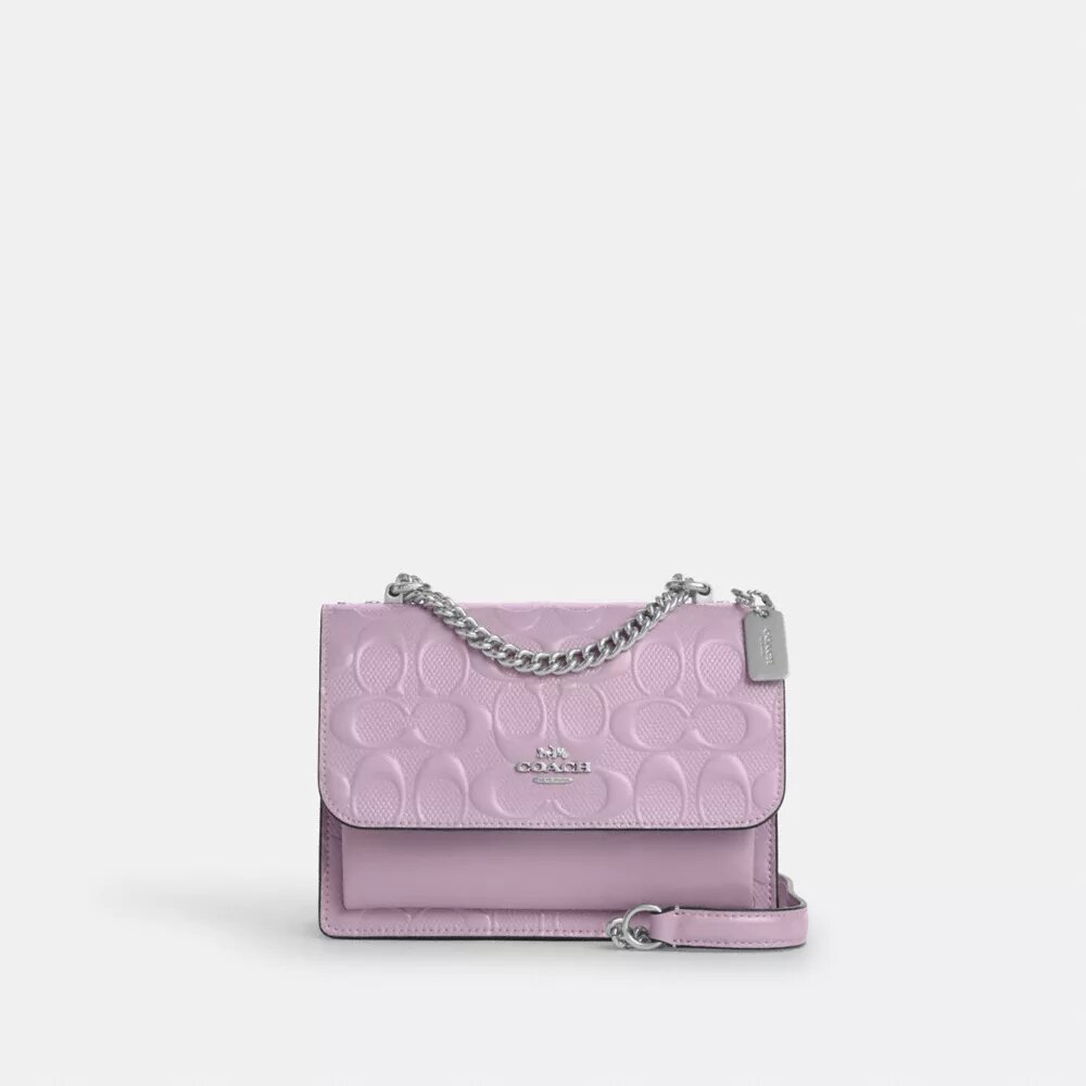 Mini Klare-crossbody-veske i signaturlær