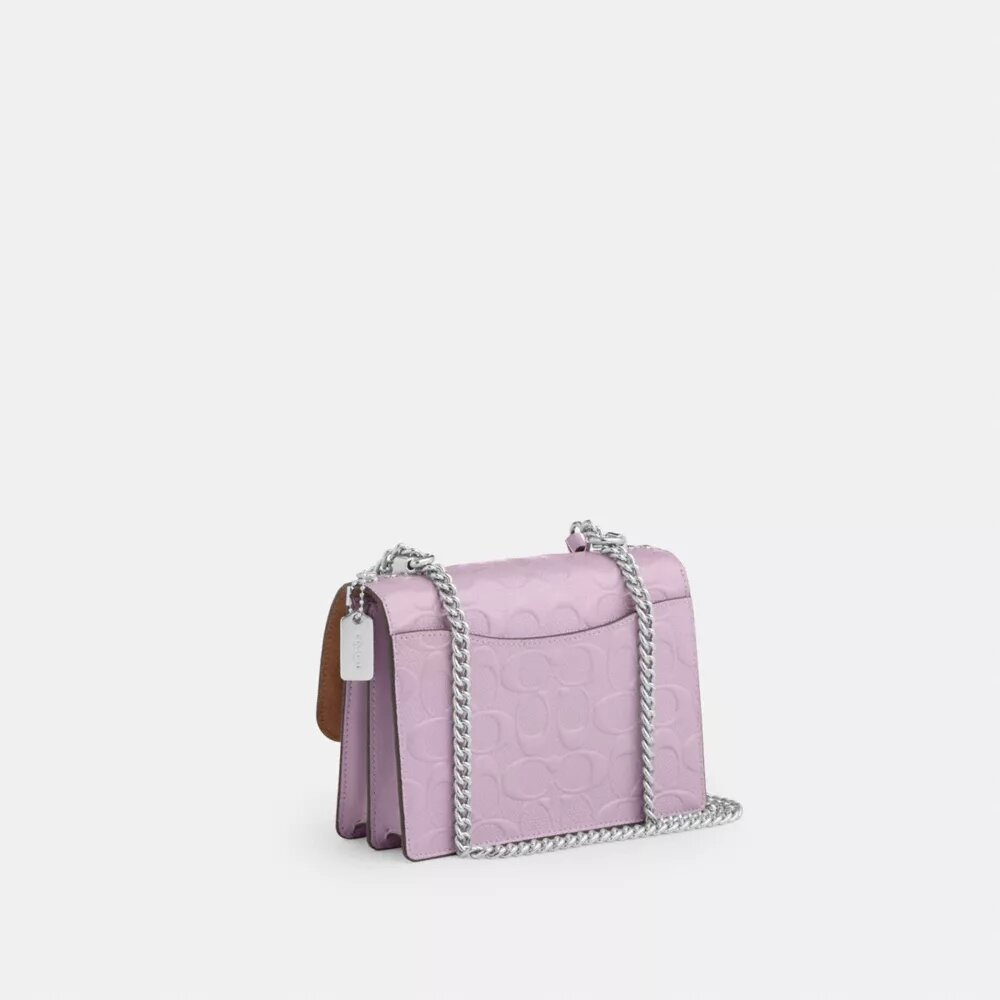Mini Klare-crossbody-veske i signaturlær