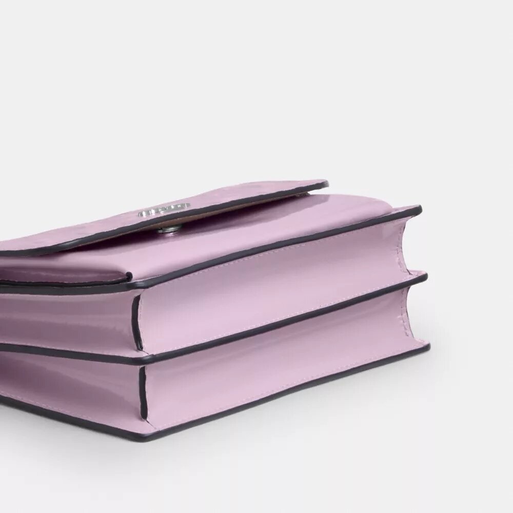 Mini Klare-crossbody-veske i signaturlær