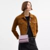 Mini Klare-crossbody-veske i signaturlær